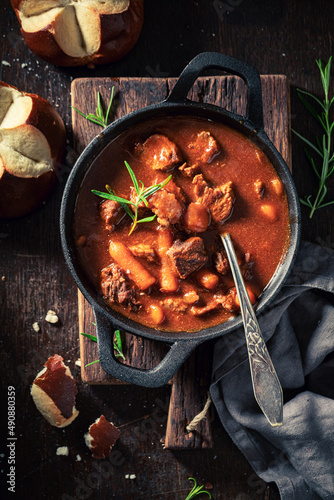 Homemade and tasty goulash made of beef and vegetables photo