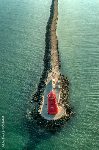 Photography Aerial view of Poolbeg Lighthouse the famous red landmark in Dublin Harbor Irela