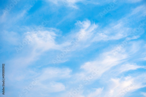Abstract blue sky background with white clouds