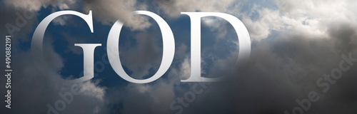 The concept of almighty god in heaven. Religious sign amongst clouds.