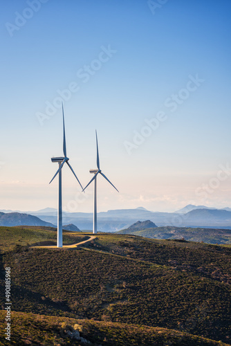 Turbines in a mountain wind farm. Ecological energy production.