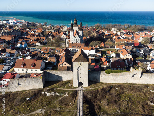 Aerial view of fhe  Dalmansporten, or Dalman gate, along the medieval city wall of Visby in the Gotland island in Swedeon on a sunny winter day photo