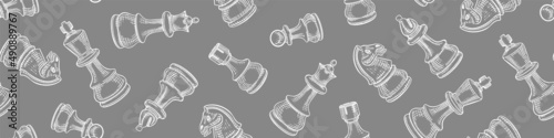 Hand drawn chess pieces seamless pattern. Check mate figures on gray background. Vector illustration.