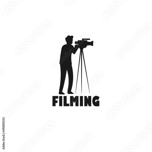 Cameraman filming a scene black vector silhouette or logo illustration.