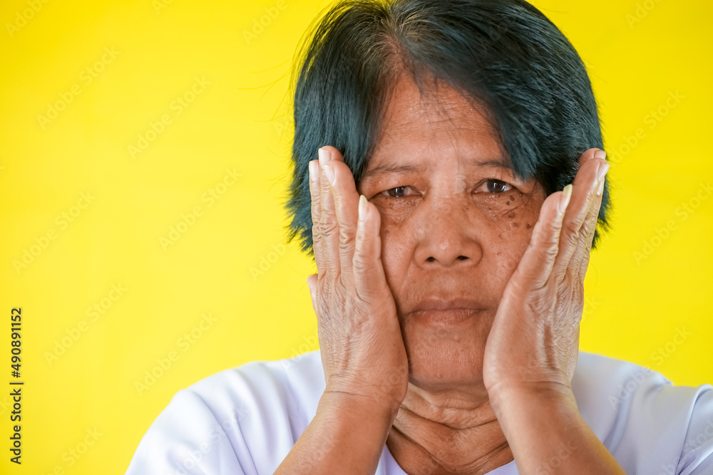 Beautiful 60s. Middle-aged adult woman looking at camera. Mature old woman very close up image. Facial health, beauty, facial care, middle-aged,  
