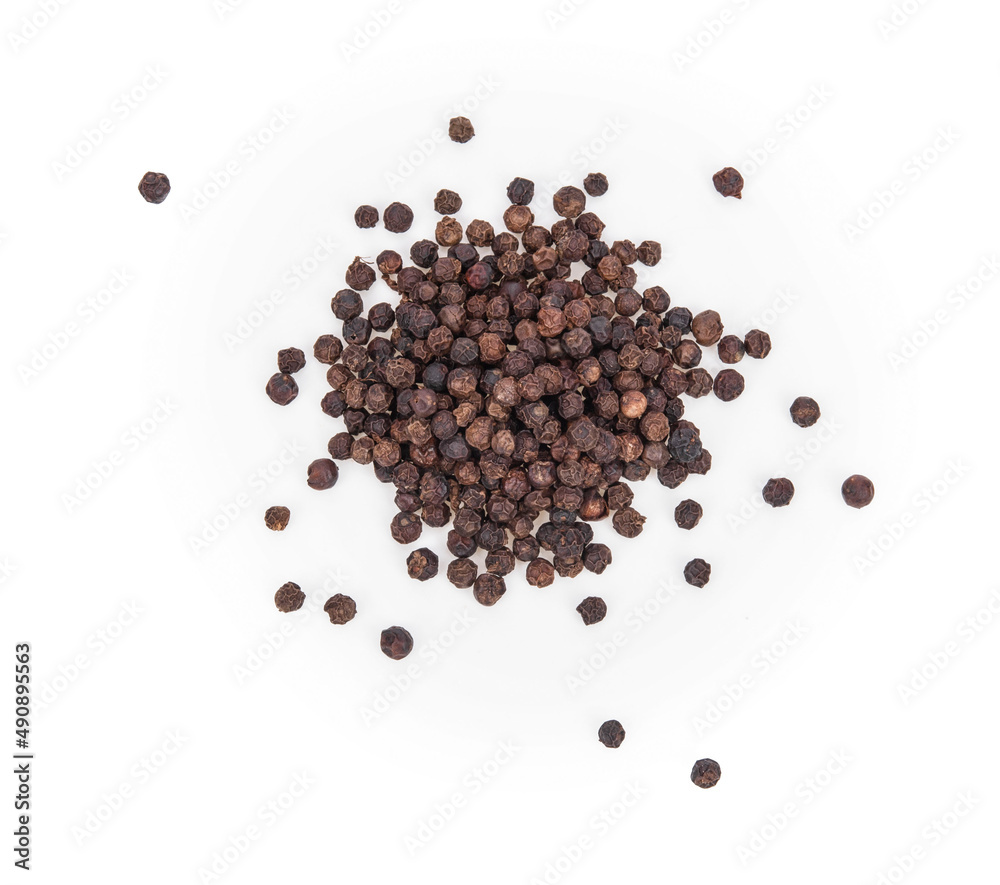 Black peppercorns isolated on white background. Black peppercorns isolated on white background.