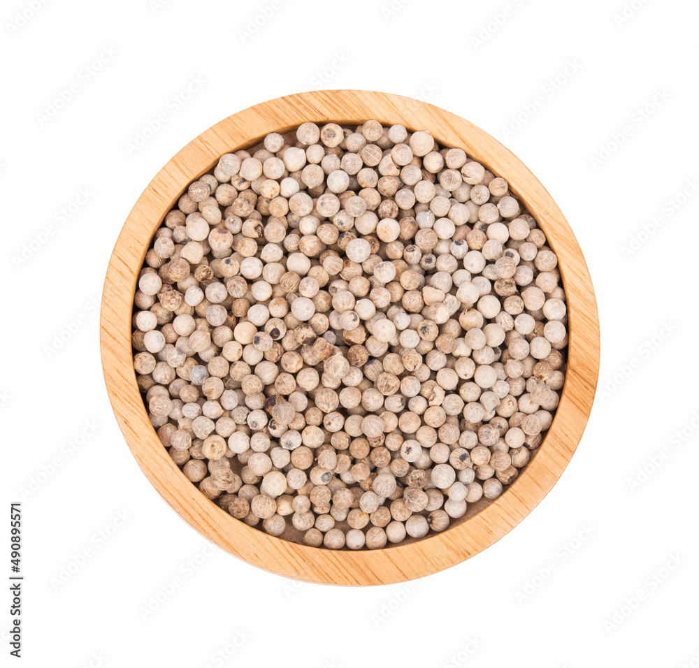 White peppercorns (white pepper) in wooden bowl isolated on white background. White peppercorns (white pepper) in wooden bowl isolated on white background.