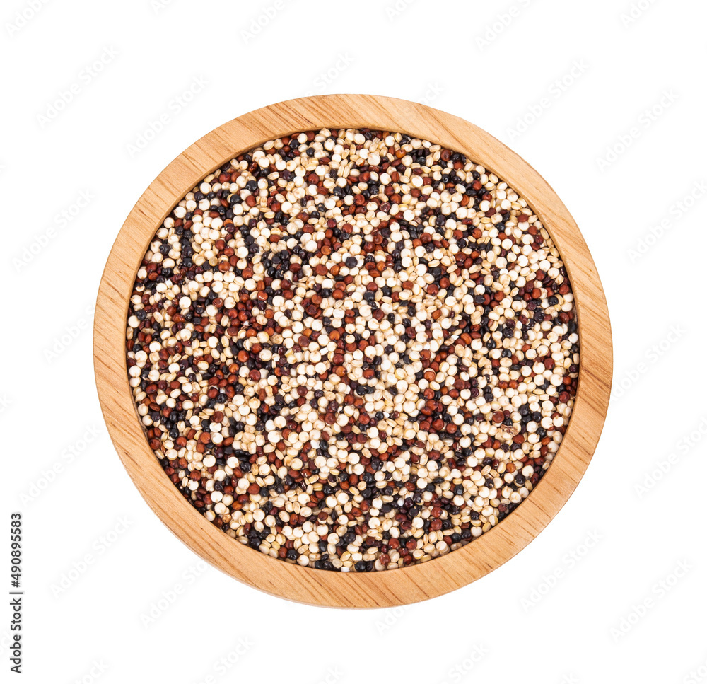 Raw mix quinoa seeds (white quinoa,black quinoa,red quinoa) in wooden bowl isolated on white background. Raw mix quinoa seeds (white quinoa,black quinoa,red quinoa) in wooden bowl isolated on white background.