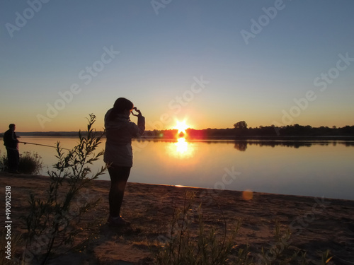 Fishing on the banks of the Oka River in the early morning; holidays in the village; Russia