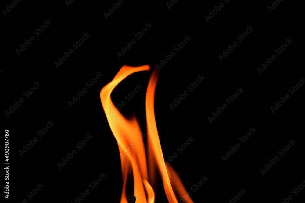 Close up burning flames on black background for graphic design or wallpaper