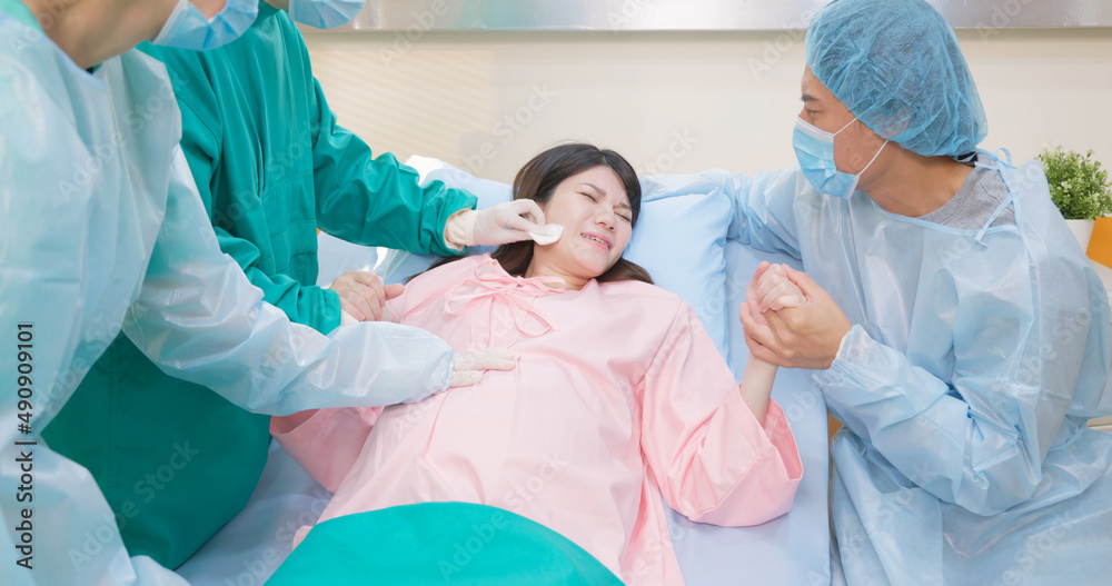 pregnant woman in delivery room pregnant woman in delivery room