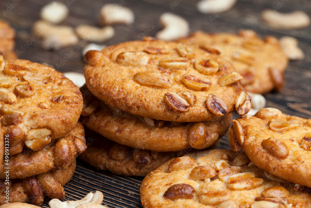 wheat-oatmeal cookies with peanuts, closeup wheat-oatmeal cookies with peanuts, closeup