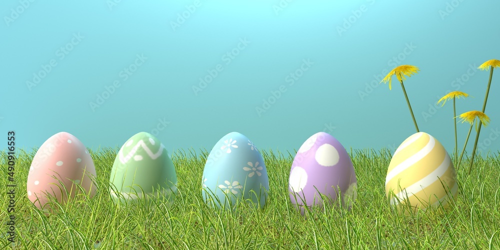 Colorful hand decorated Easter eggs with spring grass and flowers
