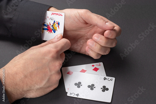 playing cards in hand photo