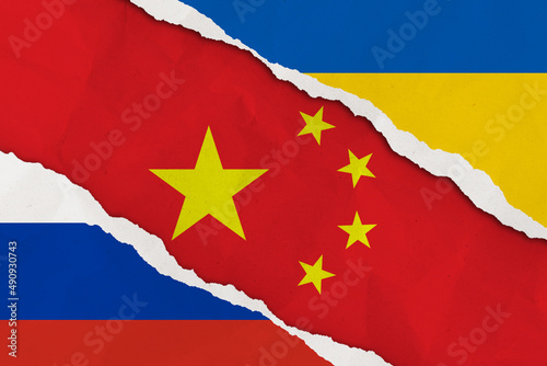 Ukraine, Russia, China flag ripped paper grunge background. Abstract Ukraine Russia politics conflicts, war concept texture background.