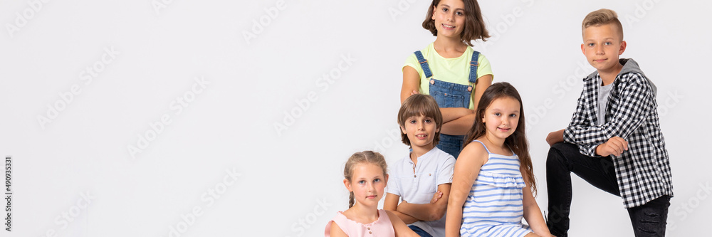 Group of cool children fooling around and making funny poses Group of cool children fooling around and making funny poses