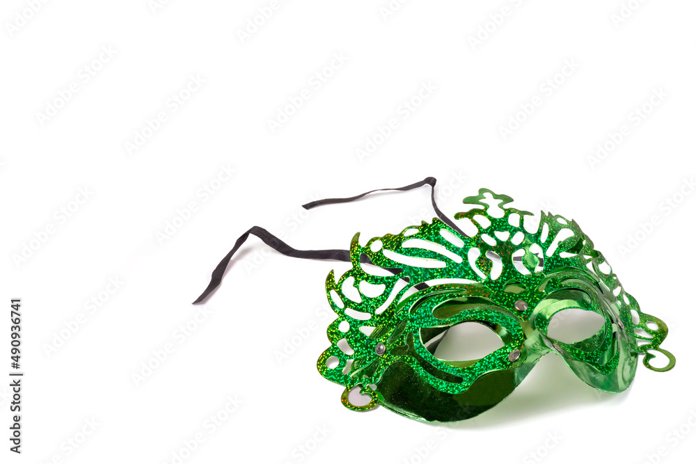 Green carnival mask isolated on white