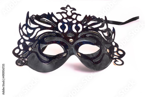 Black carnival mask isolated on white.