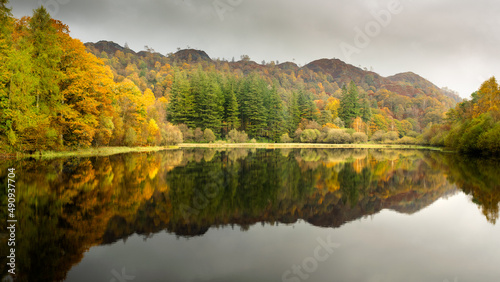 Autumn Reflections at Yew Tree Tarn in the English Lake District National Park - One of the most accessible tarns – the road from Ambleside to Coniston goes right past it, with a small car park beside