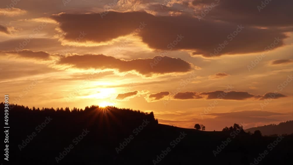 Sunrise, silhouette of a landscape with trees , colorfull clouds Sunrise, silhouette of a landscape with trees , colorfull clouds