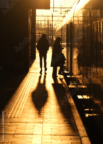 Silhouette people  golden hour  getting the train