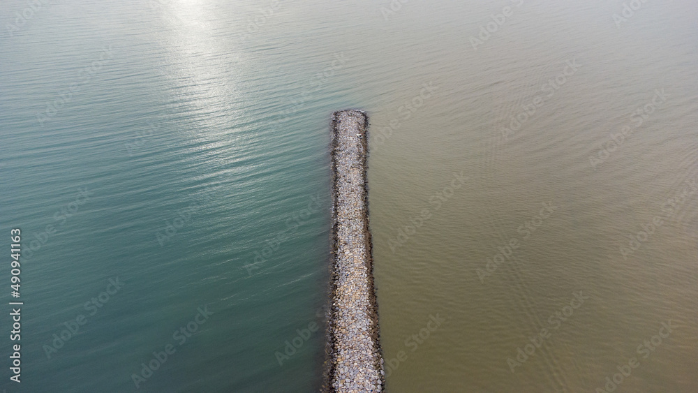 Sea and river, two different colors, aerial view Sea and river, two different colors, aerial view