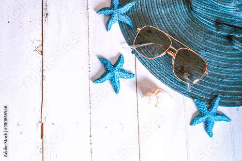 Beach holiday theme background with blue starfish