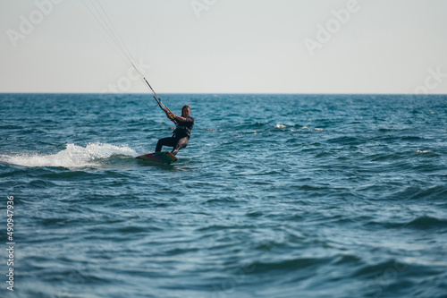 Woman kitesurfing on the ocean waters