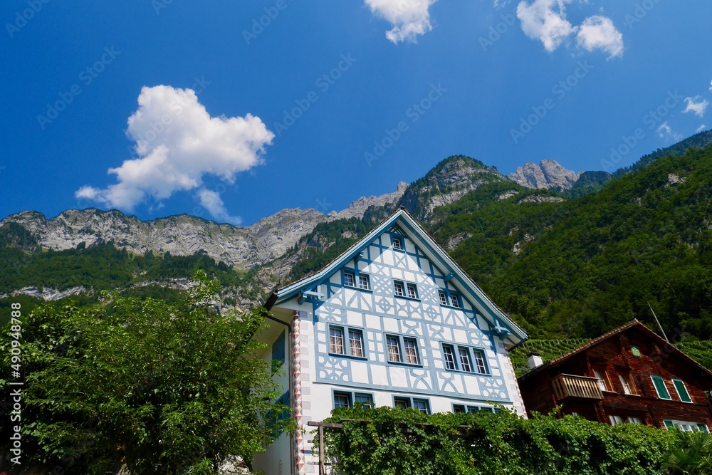 Traditional houses in Quinten situated at Lake Walen, St. Gallen, Switzerland.