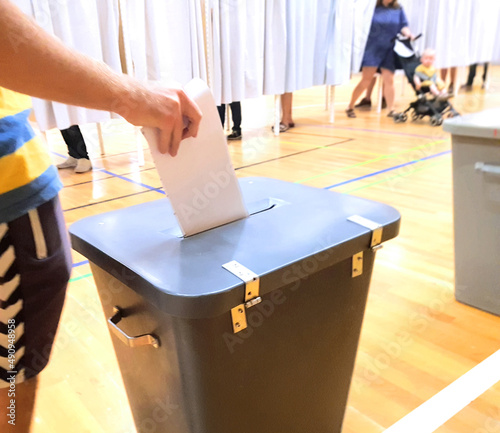 People at a Danish polling station on election night giving their anonymous votes for a political party or a political candidate