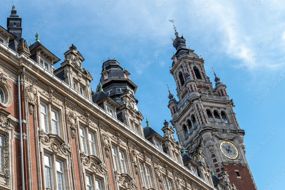 Lille, France, February 28, 2022. Houses of Lille with the belfry