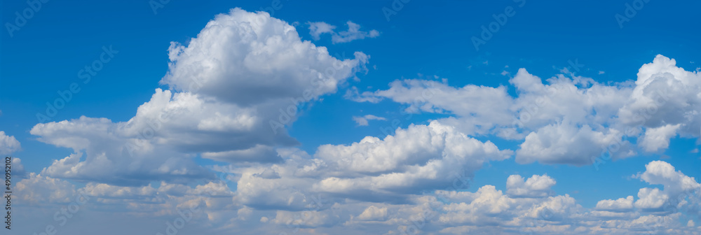 bright blue cloudy sky background