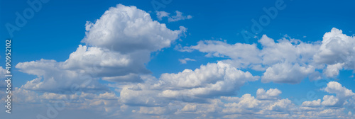 bright blue cloudy sky background