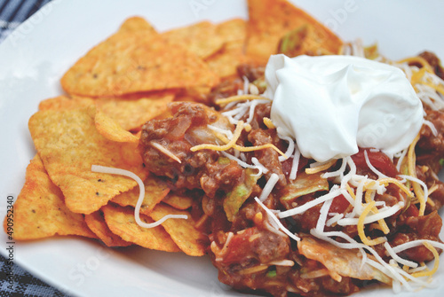 Dish of Taco Salad and Cheesy Chips 