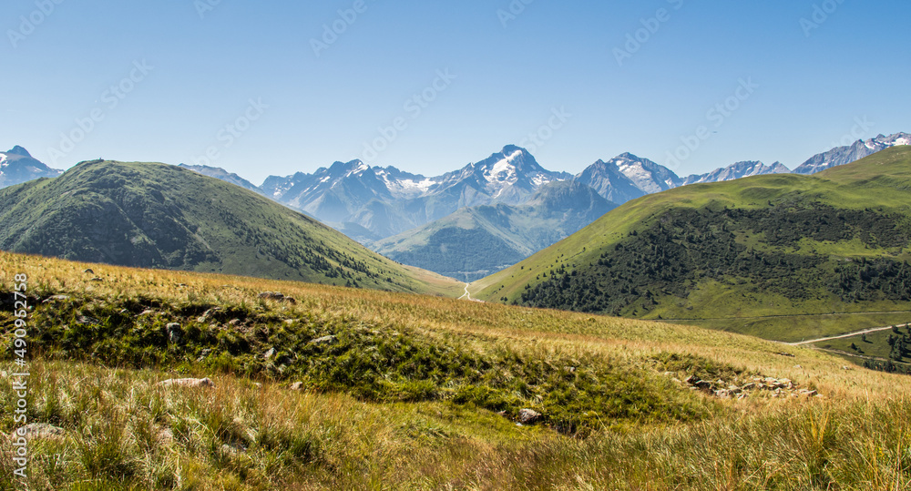 Two mountains separated by a road or path in French Alpes - Alpes d'Huez