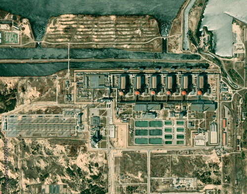 Satellite view of Zaporizhzhia nuclear power plant in southeastern Ukraine. Active plant with power generating capabilities. Fire close the plant. Element of this image are furnished by Nasa photo