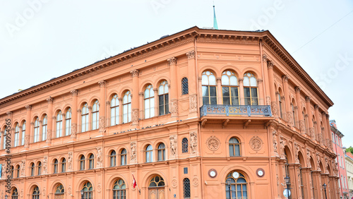 Riga, Latvia - Riga Bourse Art Museum on Cathedral Square, Neo-classical, orange building in Riga, capital of Latvia