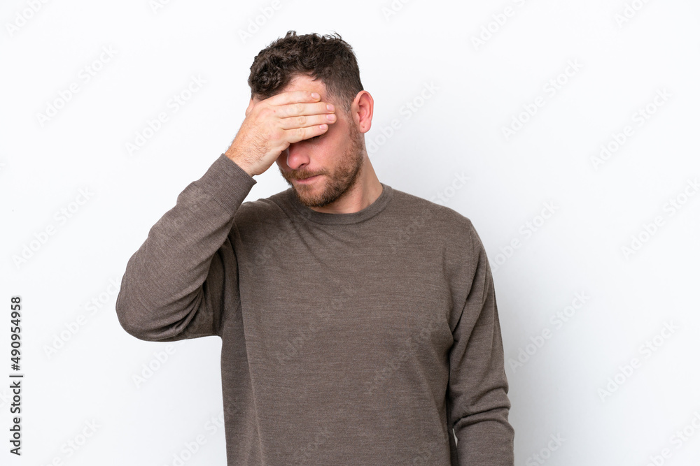 Young Brazilian man isolated on white background with headache Young Brazilian man isolated on white background with headache