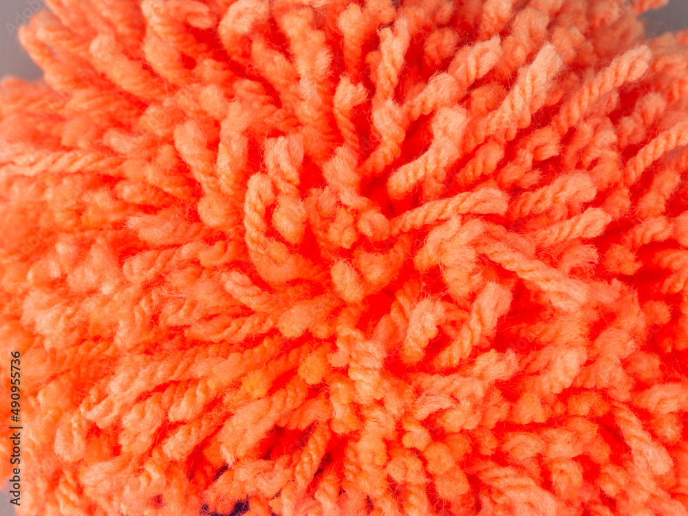 Red abstract texture made of artificial hairs. Closeup Red abstract texture made of artificial hairs. Closeup