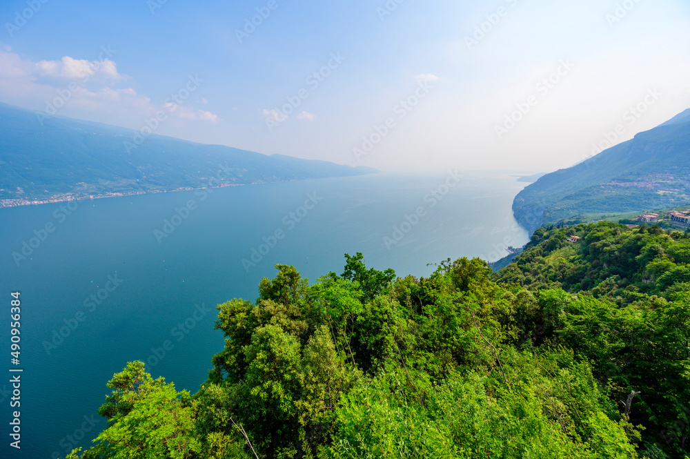 Panorama and aerial view from the town of Gardola over the south lake Garda, Italy - travel destination