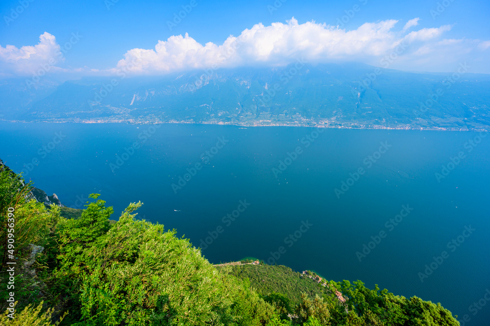 Obraz premium Panorama and aerial view from the town of Gardola over the south lake Garda, Italy - travel destination