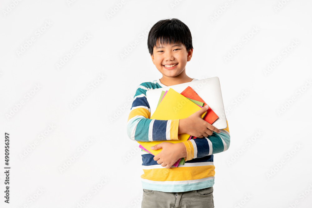 Portrait of Happy asian boy with laptop and books isolated on white background, Education and learning with technology concept Portrait of Happy asian boy with laptop and books isolated on white background, Education and learning with technology concept
