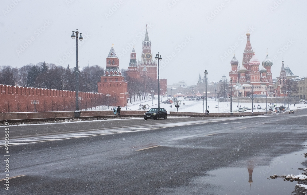 December 5, 202, Moscow, Russia. View of Vasilyevsky Spusk, the Moscow Kremlin and St. Basil's Cathedral in winter during a snowfall.