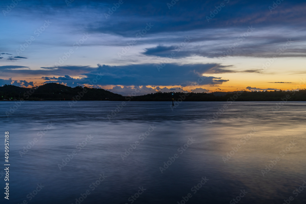 Sunrise by the bay with stratocumulus clouds Sunrise by the bay with stratocumulus clouds
