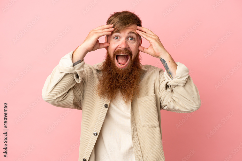 Young reddish caucasian man isolated on pink background with surprise expression Young reddish caucasian man isolated on pink background with surprise expression