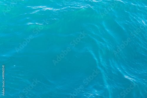 Natural sea blue background sparkling clear water