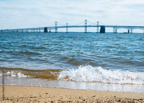 Beach at Sandy Point State Park in Annapolis  USA with the Chesapeake Bay Bridge in the background