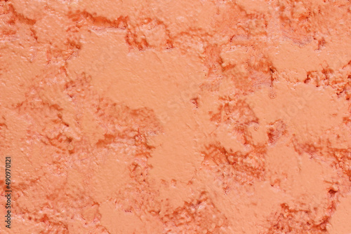 The red texture of rough surface of concrete wall background