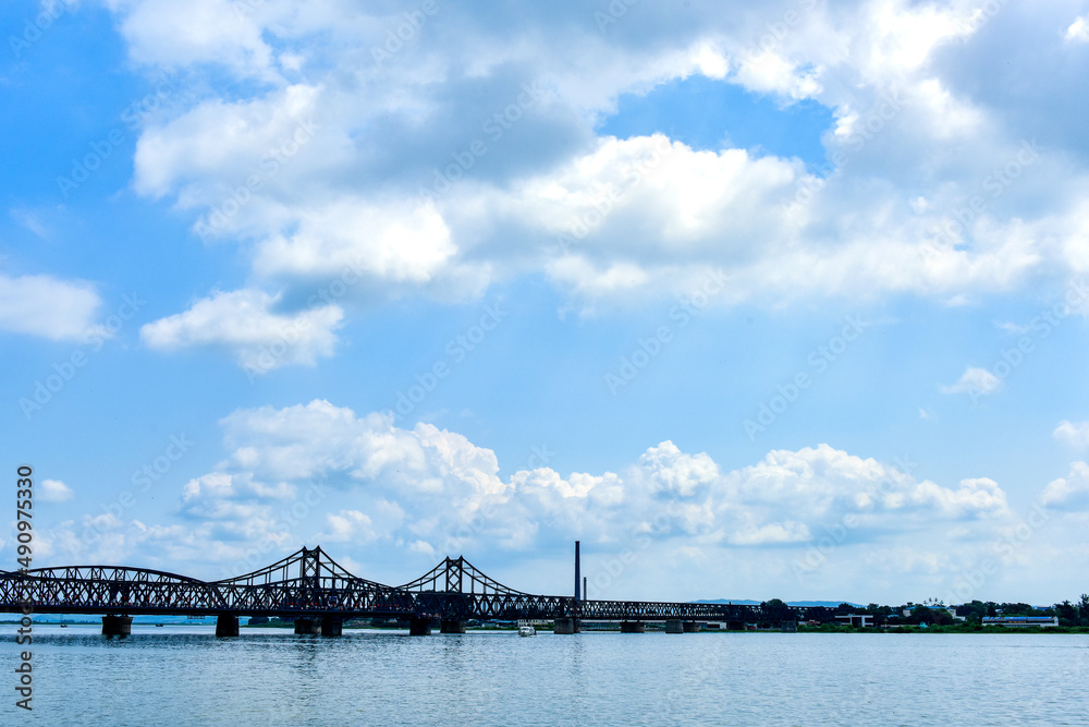 Dandong City, Liaoning Province, China - August 17, 2019: the urban landscape of Dandong City and the Korean landscape across the Yalu River