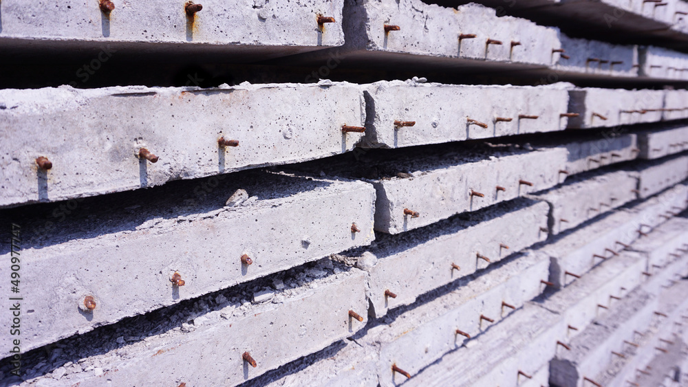 Reinforced concrete slabs are laid together for construction and structural work.